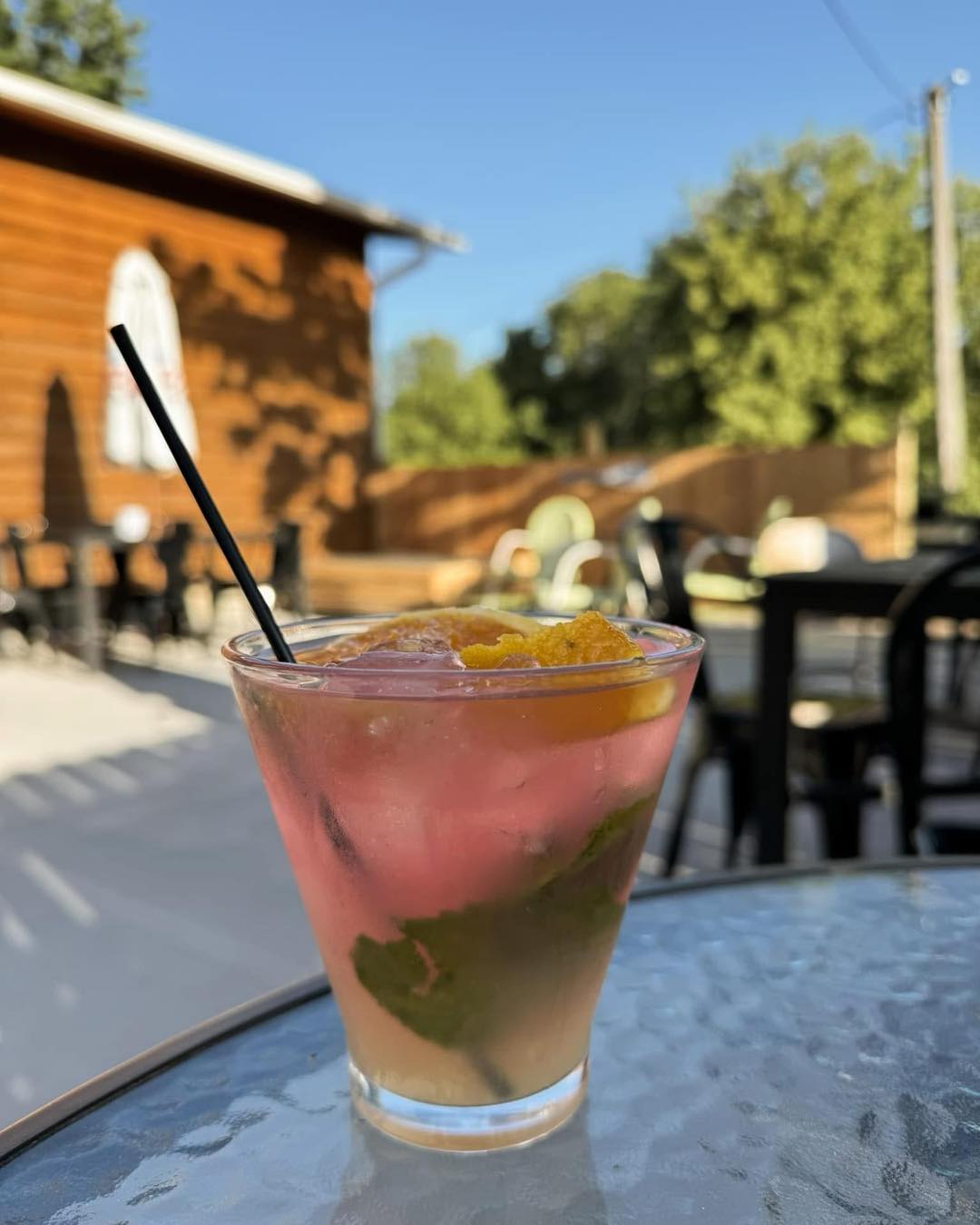 Cocktail on the Lunker's Lounge patio at Okoboji Lodge, Spirit Lake Iowa