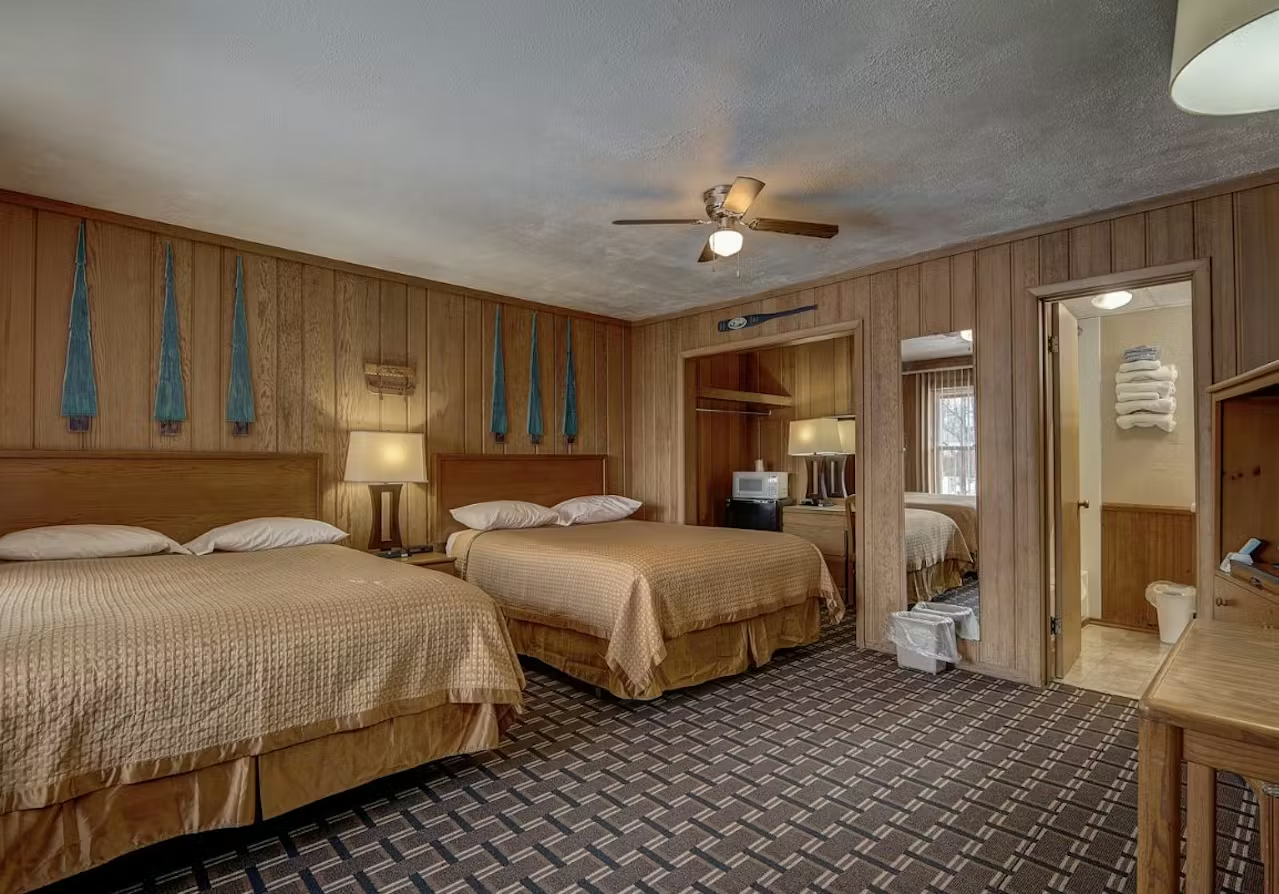Double Queen room at Okoboji Lodge — two queen beds
